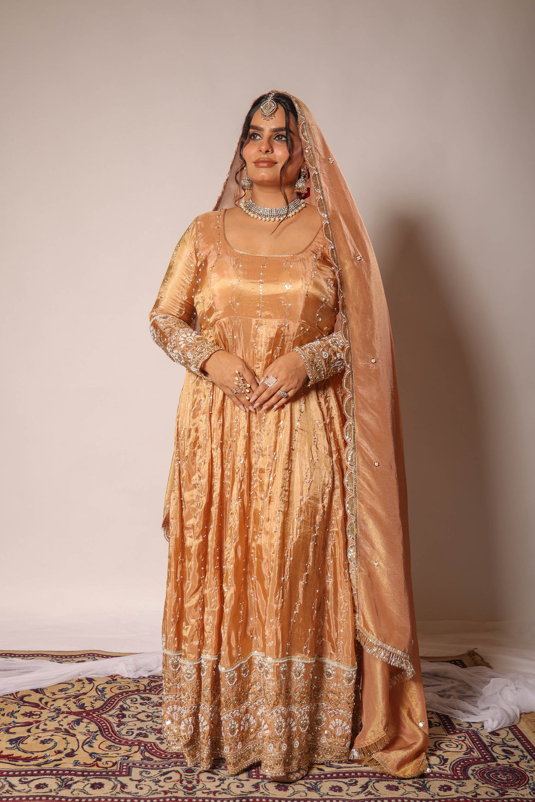 Golden embroidered anarkali set by Togaa