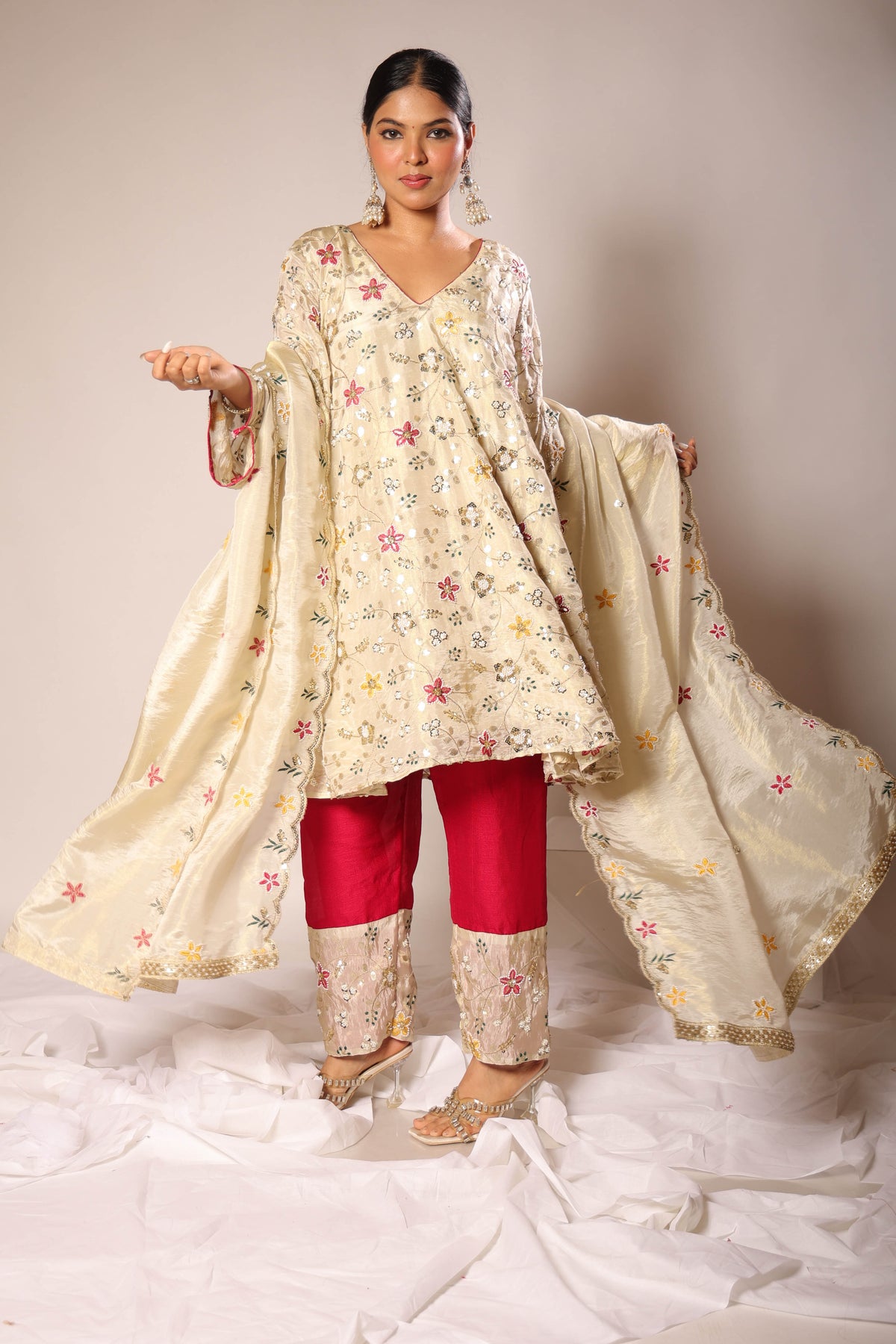 Meher ivory embroidered A-line kurta set with rani-pink pants, photo 5